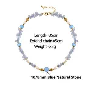Detail of beaded necklace with blue natural stone, pearls and gold extender chain