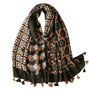 Ethnic paisley pattern scarf with long tassels and bohemian geometric color blocking