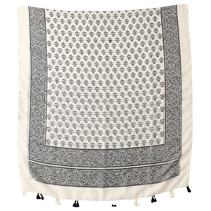 Floral print bohemian scarf with black tassels and botanical pattern on white fabric