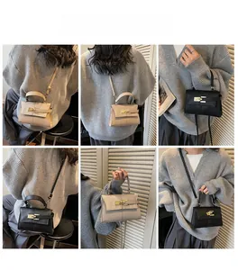 Detail shots of minimalist lock crossbody bag showing metal buckle and texture