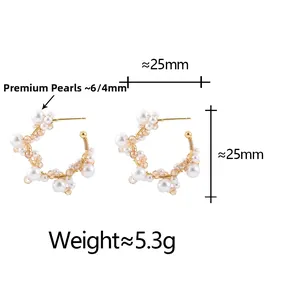 Detail view of pearl beaded hoop earrings showing 6mm and 4mm pearls with 25mm diameter