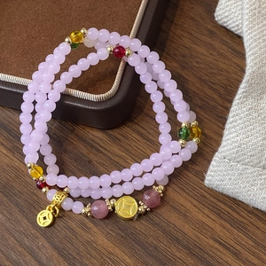 Natural purple crystal beaded bracelet for women with gold coins and lucky charms