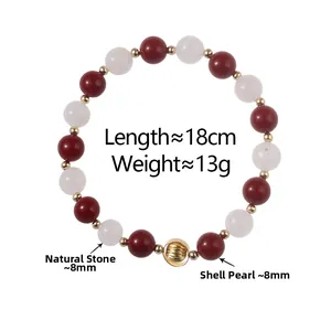 Detail of beaded bracelet with red agate, white chalcedony and gold hollow spacer beads