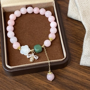 Pink strawberry crystal beaded bracelet with white camellia and golden bee charm pendant