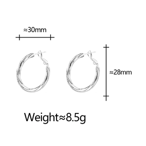 Detailed view of silver twist hoop earrings with 30mm diameter measurements
