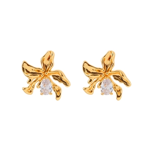 Vintage style gold orchid flower stud earrings with pear-cut zircon on white background