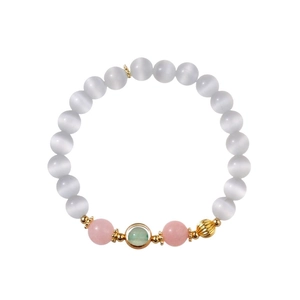 Handmade beaded bracelet with natural cat-eye stones and green gemstone in gold settings