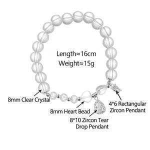 Clear crystal beaded bracelet with zircon teardrop charm and heart bead detail