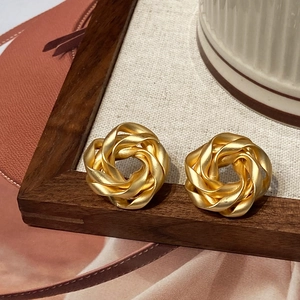 French style matte gold irregular spiral knot earrings with elegant brushed texture
