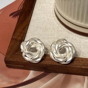 French matte silver irregular flower stud earrings in artistic spiral rose design