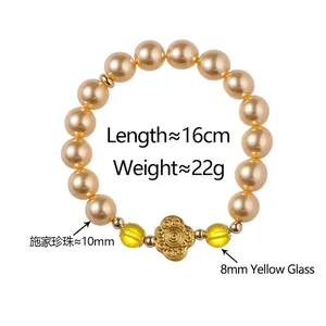 Bracelet en perles dorées et verre jaune avec pendentif nuage de bon augure