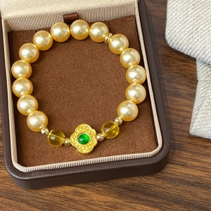 Bracelet Perlé En Künstliche Perles Dorées Avec Künstliche Perles En Verre Jaunes Et Pendentif Fleur Gemme Verte Style Chinois Vintage Pour Femmes