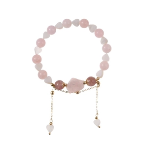 Pink strawberry crystal beaded bracelet with white heart charms and gold tassels