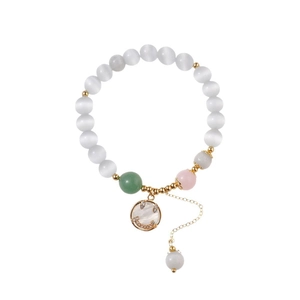 Cat eye bead bracelet with white mop smiley face pendant and gold chain adjustment