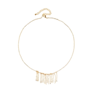 Elegant gold fringe necklace featuring delicate metal tassels on a minimalist chain