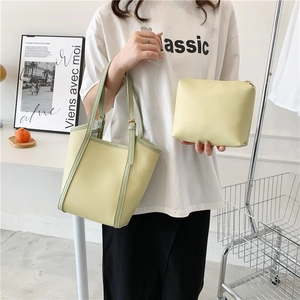 Large pale yellow fashion tote bag with matching storage pouch for women daily use