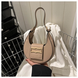 Chic beige crescent underarm bag with stone texture and vintage gold metal buckle hardware