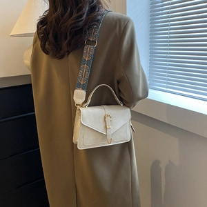 Minimalist cream white crossbody bag with stylish geometric wide strap and metal buckle