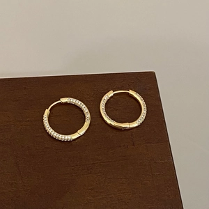 Detailed view of 18K gold plated hoop earrings with micro-pave white zircon stones