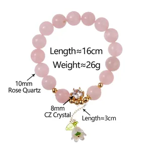 Rose quartz beaded bracelet featuring a lily of the valley pendant and zircon charm