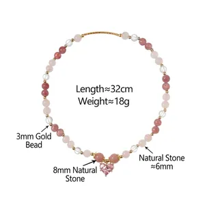 Pink heart pendant necklace with natural stone beads and gold accents on white background