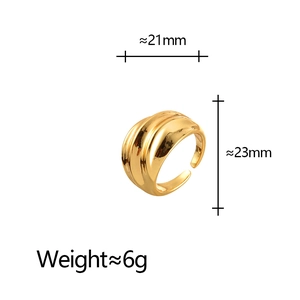 Detail view of wide gold wavy textured open ring with dimensions and weight specs