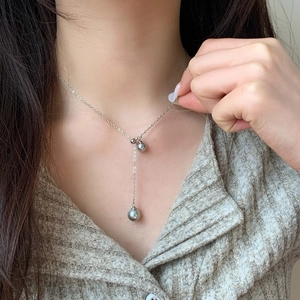 Elegant Y-shaped silver necklace with two grey pearls and thin chain for women