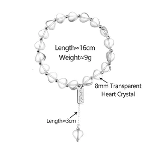 Transparent heart-shaped crystal beaded bracelet with silver spacers and extension chain