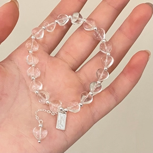 Handmade transparent heart-shaped crystal beaded bracelet with silver metal spacers and tags