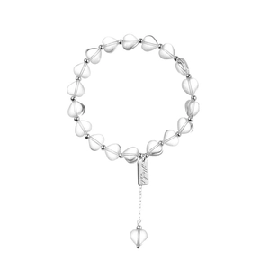 Transparent heart-shaped crystal beaded bracelet with silver beads and handmade tag