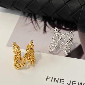 Irregular textured geometric open rings in gold and silver finish with braided design