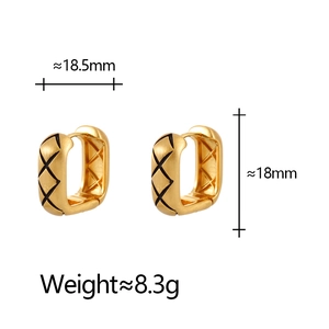 Detailed view of gold plated square hoop earrings with black quilted diamond texture