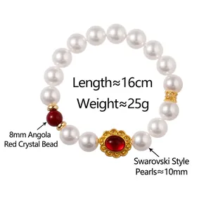 Französisches Retro-Armband mit roten Achatperlen und goldenen Details auf weißem Grund