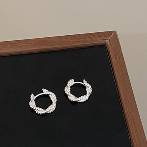 Shiny silver twisted rope hoop earrings for women with minimalist braided texture