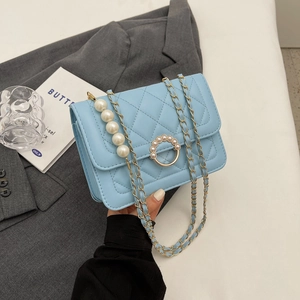 Light blue quilted PU leather mini bag with pearl chain strap and gold buckle