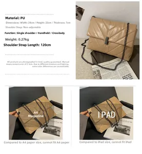Detailed view of beige quilted shoulder bag with dimensions 28x22x7cm and chain strap