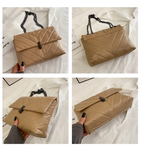 Detail of khaki V-quilted crossbody bag with dark metal chain and rectangle lock
