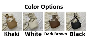 Detail view of minimalist half-moon shoulder bags in khaki, white, brown and black colors