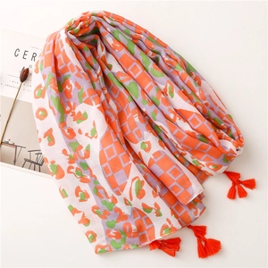 Soft thick long scarf with orange geometric diamond print and tassel decorative edges