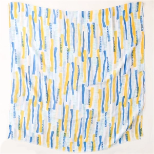 Detail of mint green summer scarf with abstract yellow and blue vertical stripes