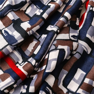 Detailed macro view of geometric printed fabric with soft texture and vibrant colors