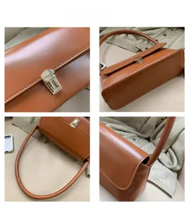 Detailed close-up of brown baguette bag featuring a gold buckle and faux leather texture