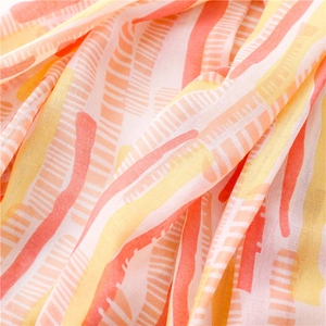 Macro detail of abstract brushstroke print on lightweight semi-transparent chiffon scarf