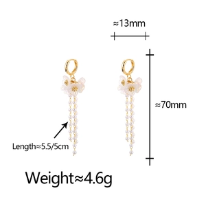 Detail of flower earrings with pearl tassels showing dimensions of 13mm width and 70mm length