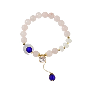 Elegant beaded bracelet with pink stones, moon charm and zircon pendant on white background