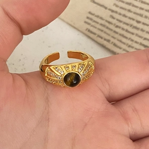 French vintage tiger eye ring with gold sunburst design and zircon accents