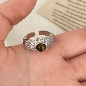 Adjustable silver ring with tiger eye stone and radial zircon accents for women