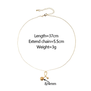 Detail of gold minimalist chain with spherical pendants including length and weight specs