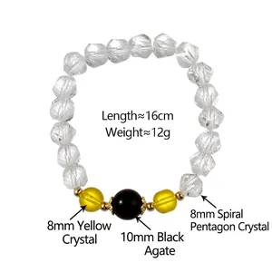 Crystal beaded bracelet with black agate main bead and yellow crystal accents on white background