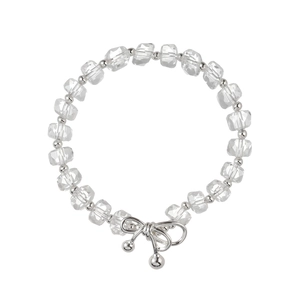 Elegant transparent faceted crystal bead bracelet with a silver bow pendant on white base